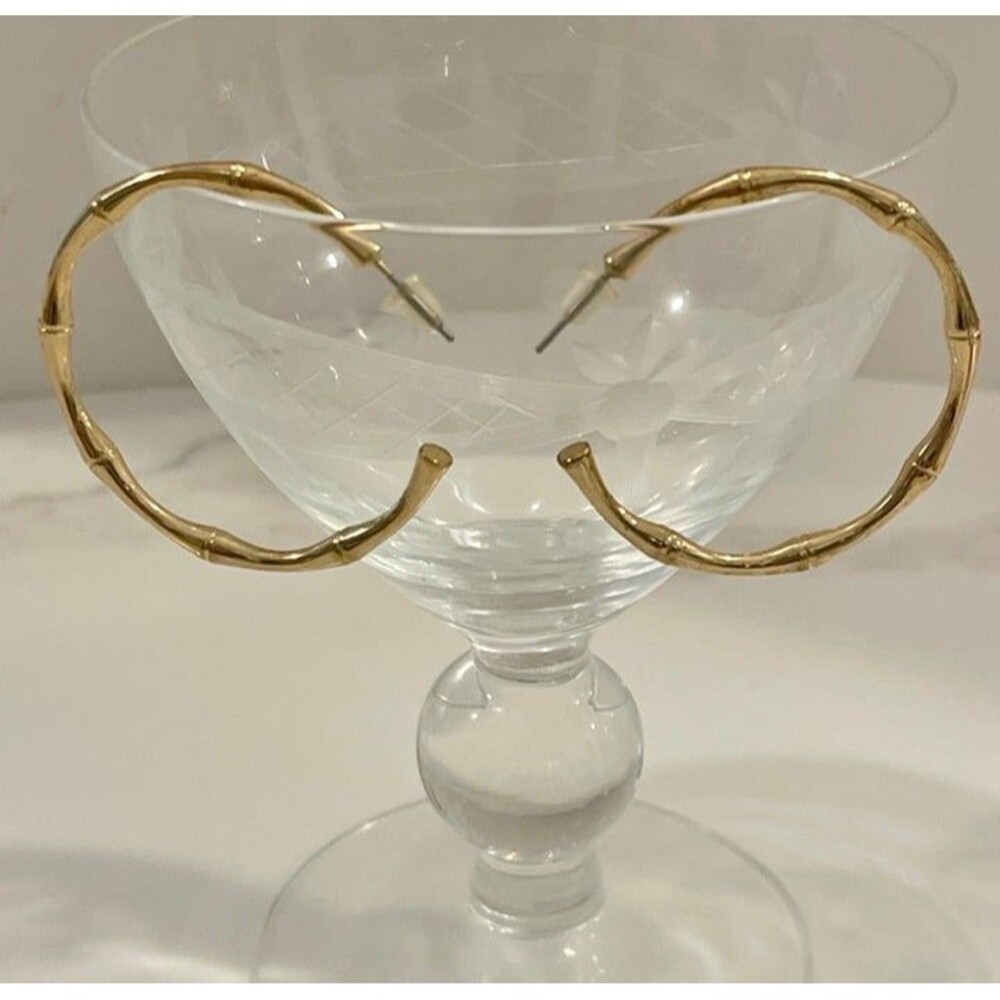 Large gold bamboo design hoop earrings